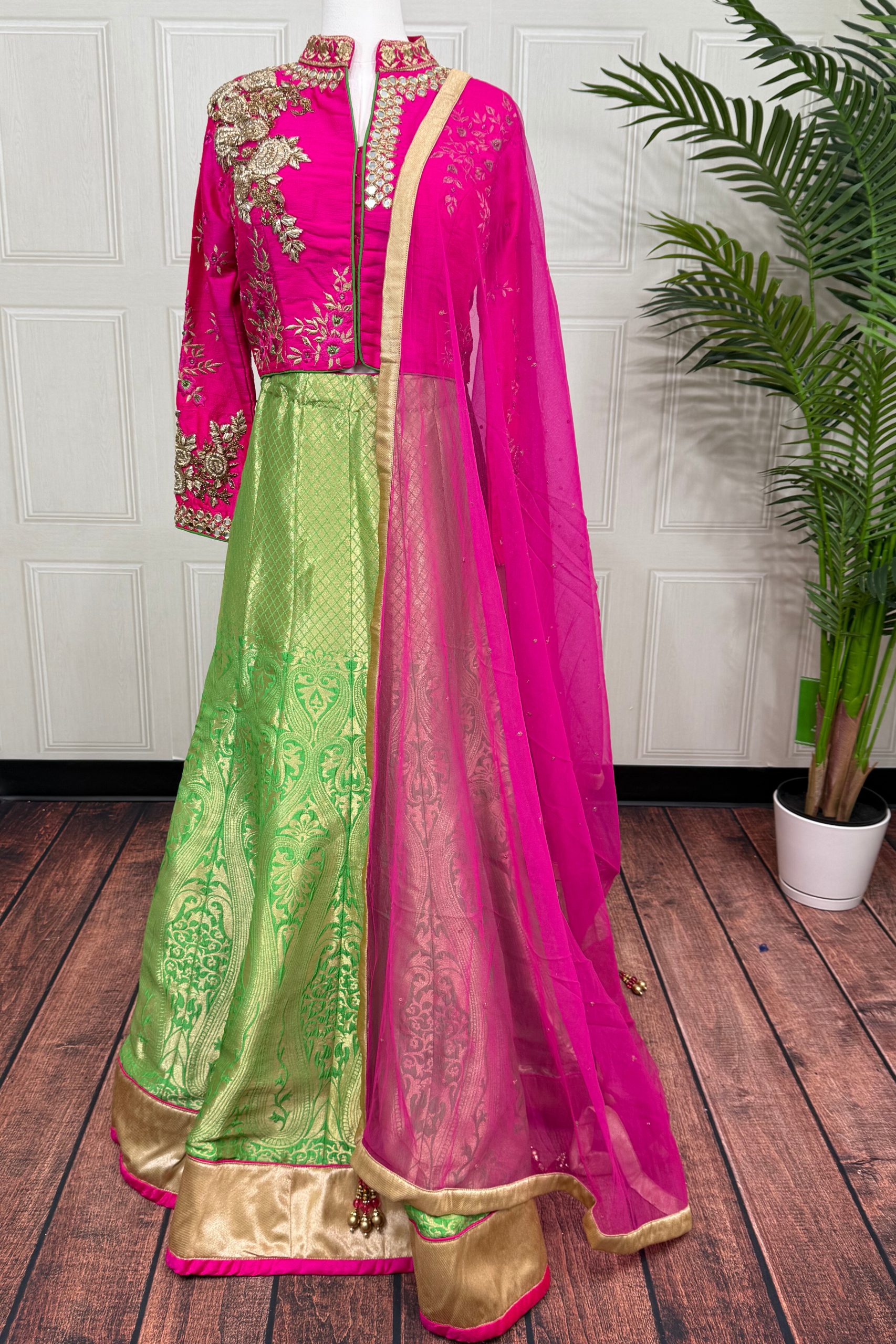 Hot Pink and Green Banarasi Lehenga with Zardozi and Mirror Work