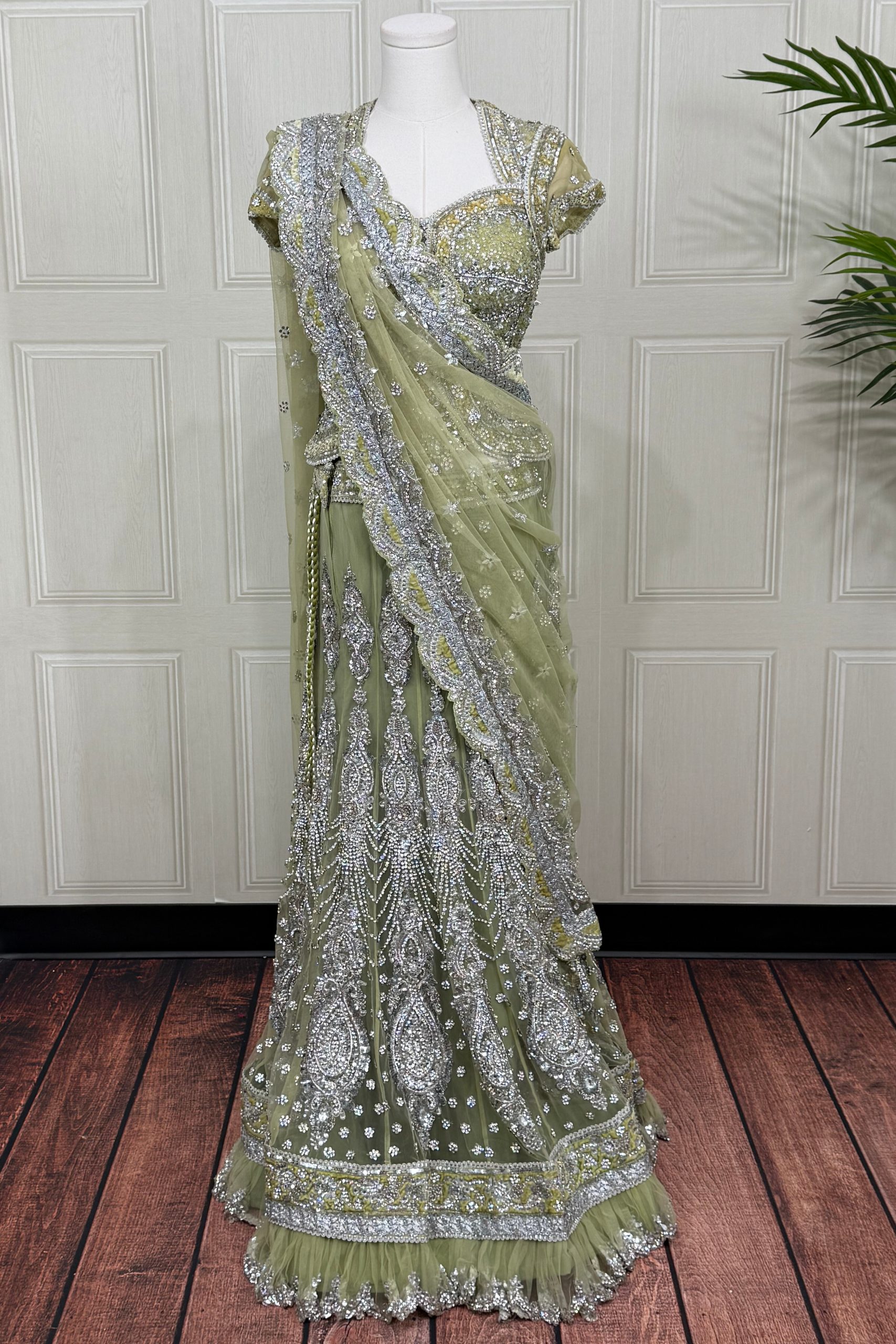 Sage Green Soft Net Lehenga Set with Heavy Zardozi and Stone Work